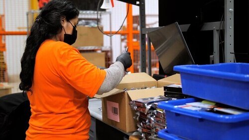 SK tes Employee packs hard drives for IT Asset Disposition