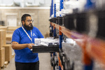 Operator stores refurbished mobile phones ready for resale