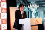 Hyejeong Ahn from the Embassy of the Republic of Korea speaks to guests at SK Tes Rotterdam Opening