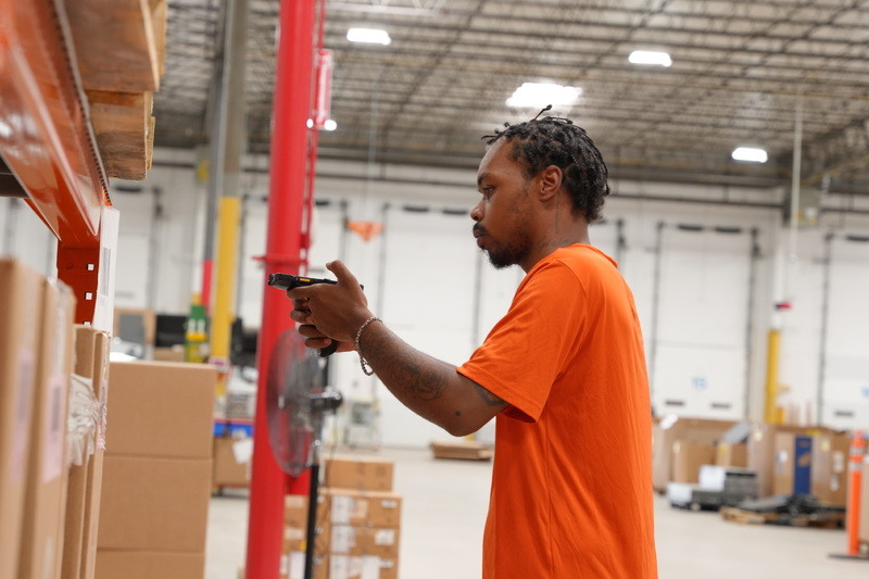 SK tes scanning boxes into storage