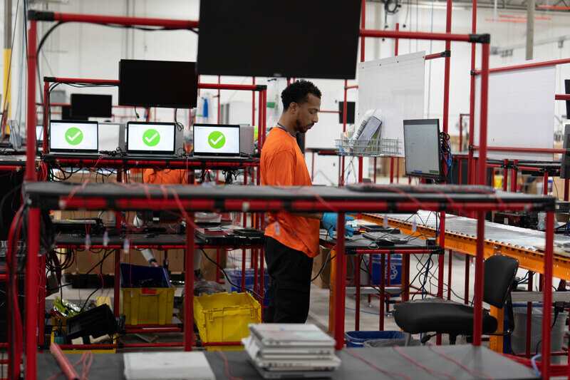 SK tes employee in US processing laptops for secure data destruction