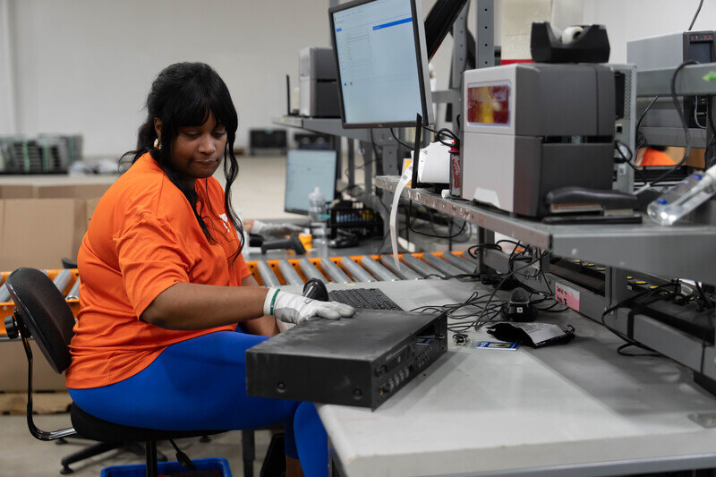 SK tes team member processing corporate IT assets