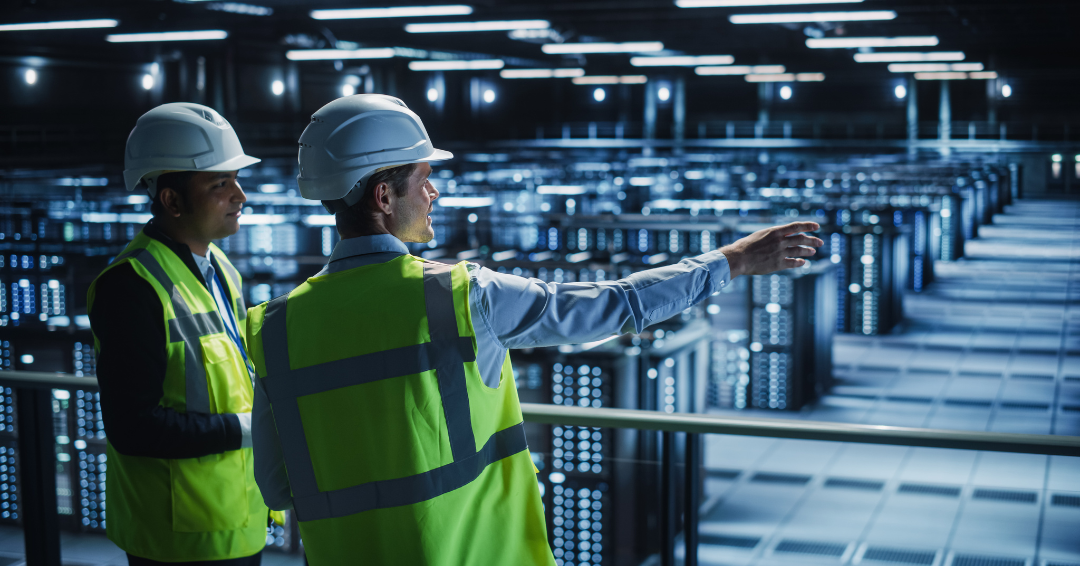 Data Center IT Specialist and System administrator Talk, Using Tablet Computer, Wearing Safety Wests